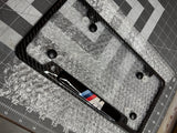BMW M POWER CARBON FIBER PLATE FRAME. 4 bolt hole, notches.  Raised M power badge