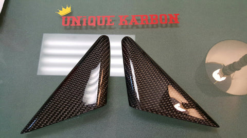Porsche carbon fiber triangle mirror covers.