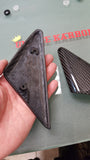 Porsche carbon fiber triangle mirror covers.